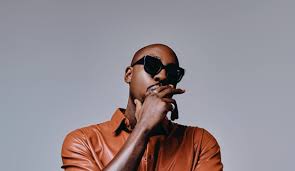 Bien Responds with Humor to YY Comedian on Why Kenyan Artists Didn’t Unite for Baba’s Tribute Song