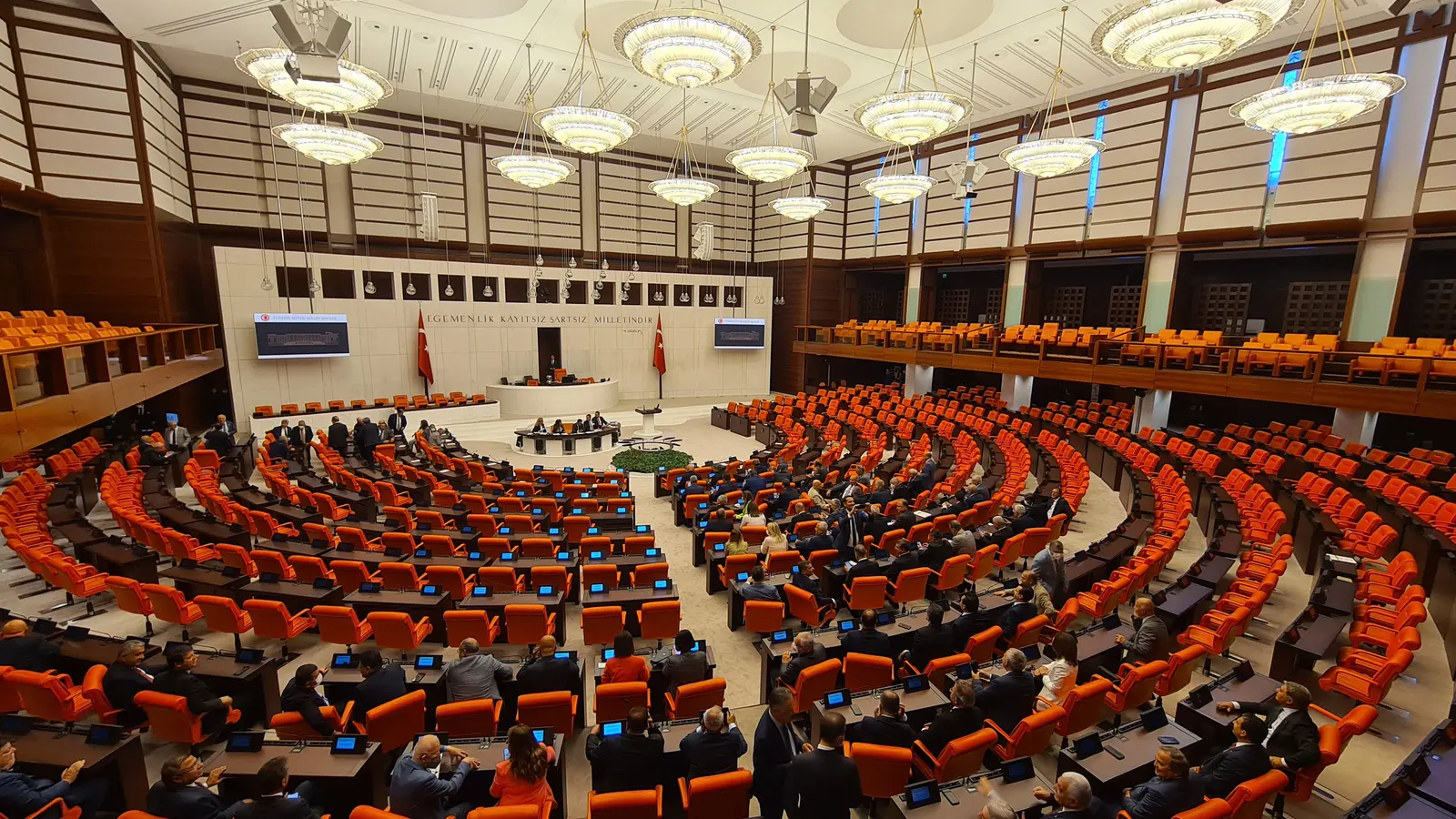 Lawmakers seated inside the Grand National Assembly of Turkey chamber in Ankara